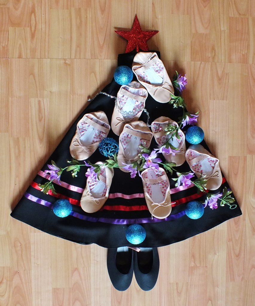 Xmas tree made with shoes, skirts and props from MyBallet Academy's uniform.